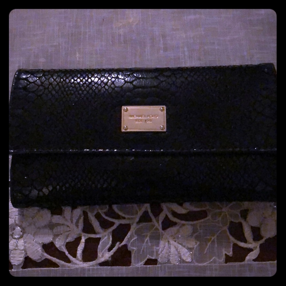Snakeskin wallet.